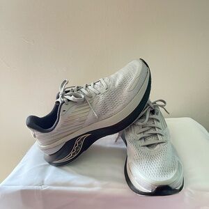 Men gray Saucony tennis shoes, size 9.5, never worn.